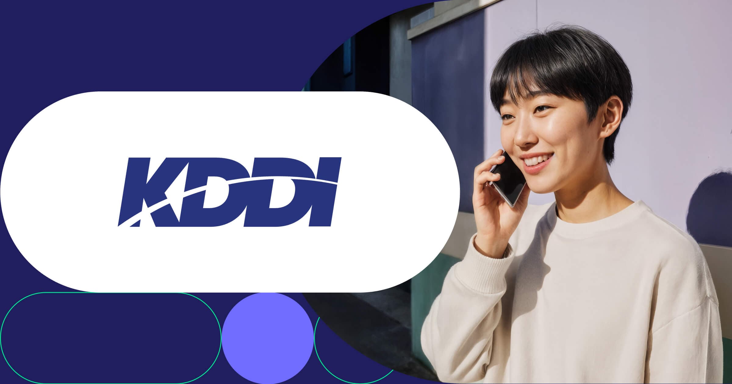 KDDI logo with smiling customer making phone call using Japanese telecommunications mobile network services