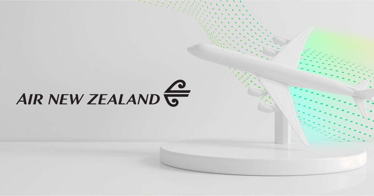Air New Zealand logo over an image of the city of Auckland.